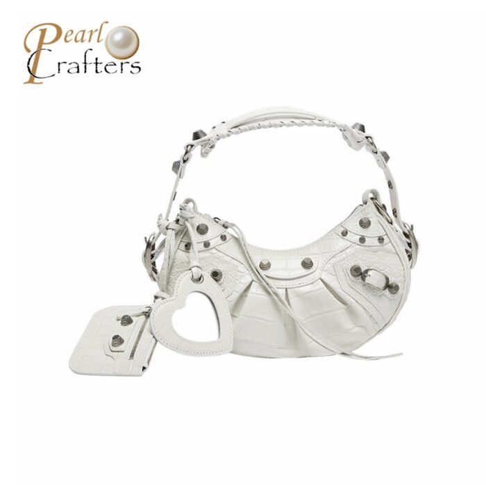 BALENCIAGA Le Cagole XS studded crinkled-leather shoulder bag White - Image 1